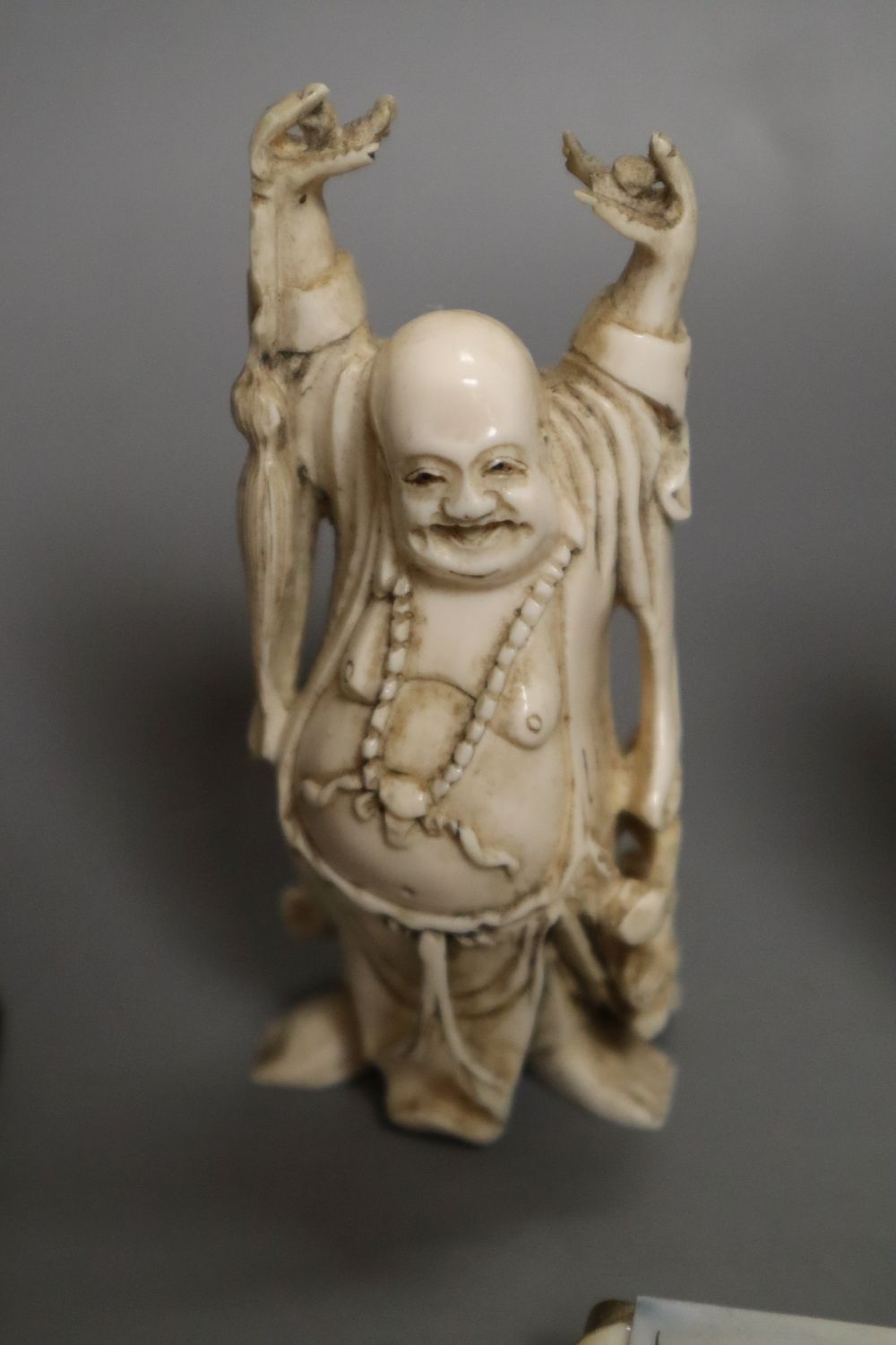 A group of Japanese and Chinese ivory figures and carvings, 19th/early 20th century, tallest 24cm